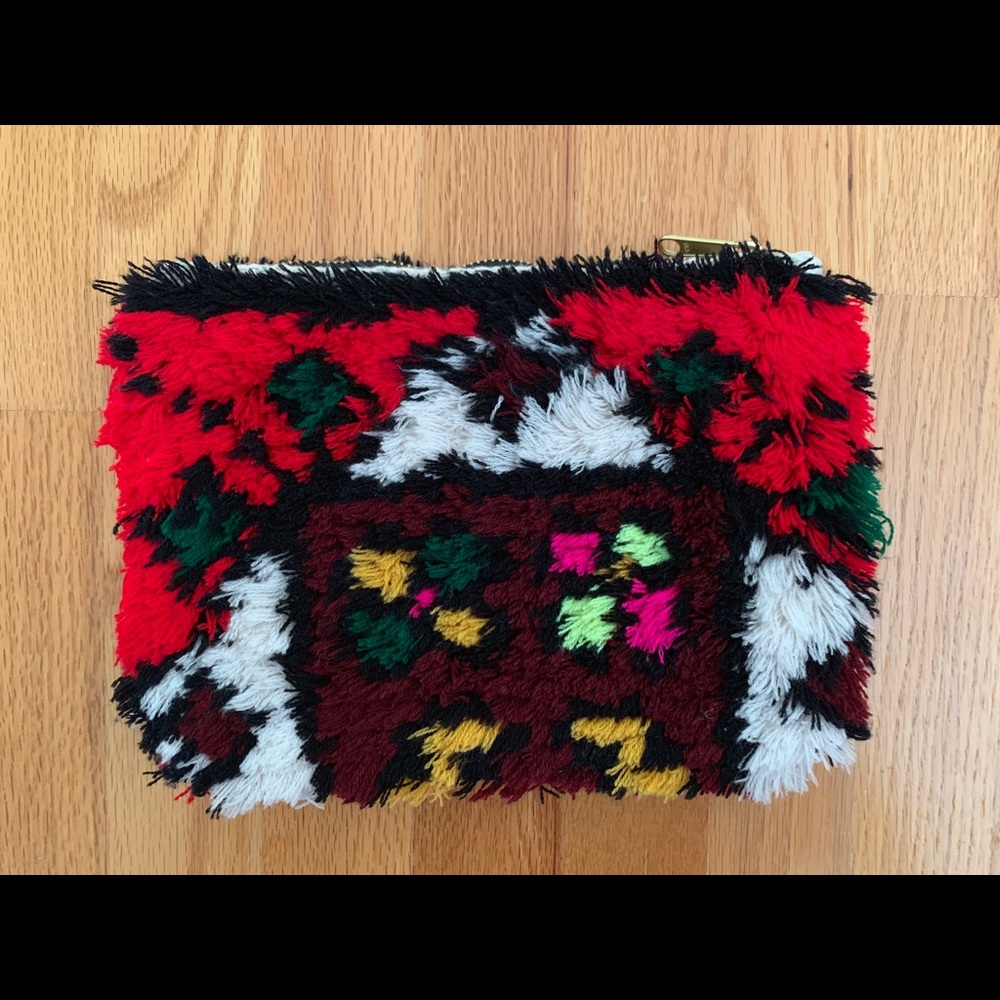 Anthropologie fuzzy carpet clutch